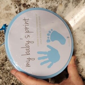 My baby's print new in tin box NWT